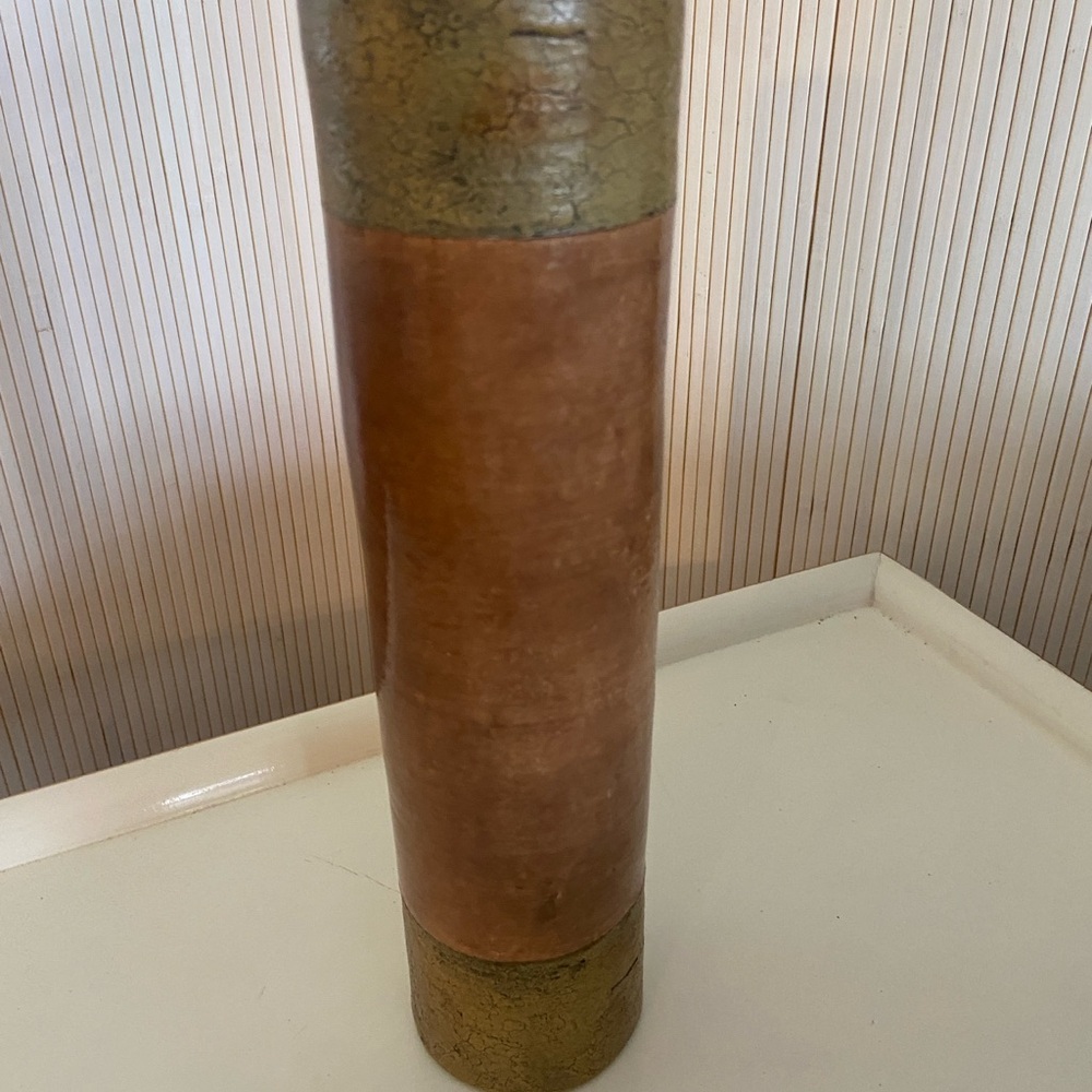 Elegant Brown and Green Decorative Vase
Cylinder shape.   H. 12” x. 3” diameter